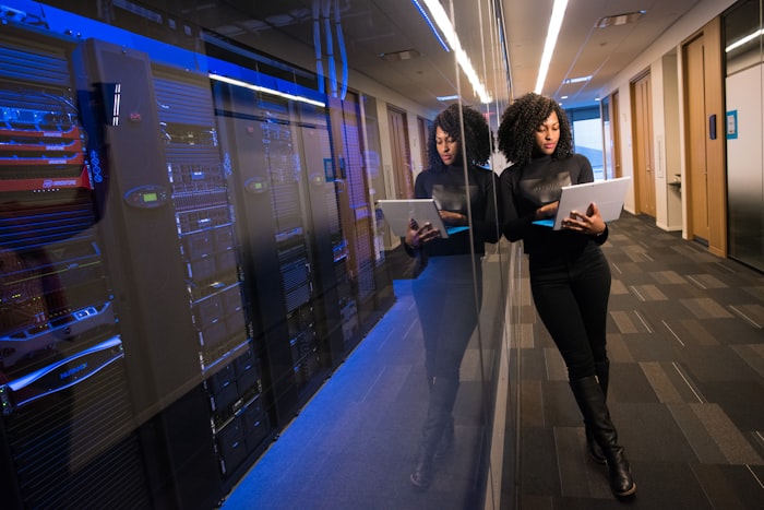 Woman from an underrepresented community building AI skills at her computer