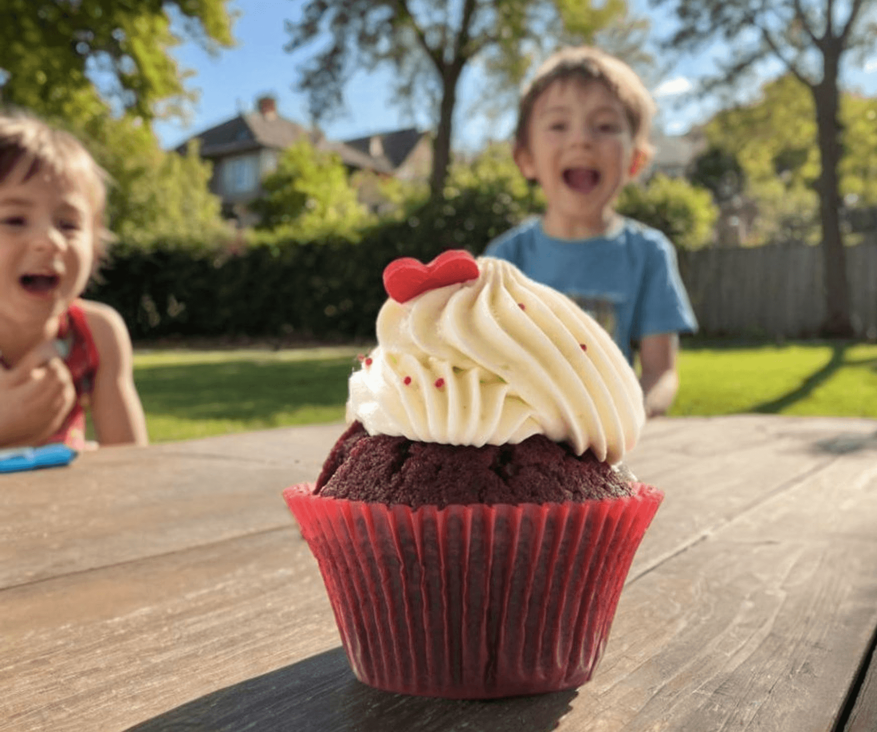 Red velvet cupcake in styled scene created with Caspa AI product photo generator